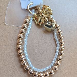 Gold and White Beaded Phone Charm with Heart Charm